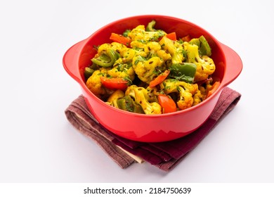 Indian Phool Gobi Shimla Mirch Sabji Recipe Or Capsicum Cauliflower Sabzi  - a Healthy And Homemade Dry Vegetable Dish.