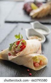 A indian Pita stuffed with chicken and peppers