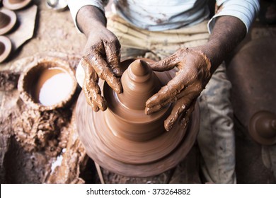 Indian Potter At Work