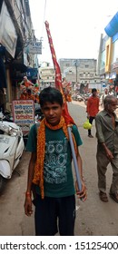 an indian religious boy standing on road with flag holding at district Katni Madhya Pradesh in India shot captured on sep 2019