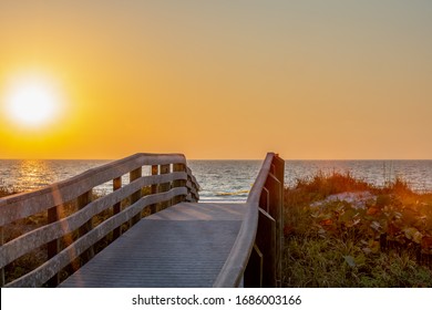 Indian Rocks Beach Florida Sunset and wooden footbridge
