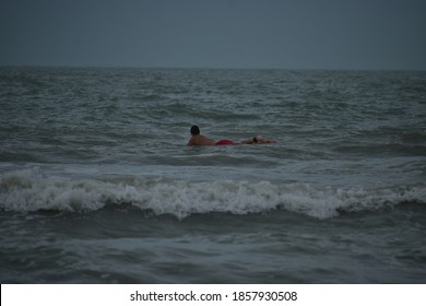 Indian Rocks Beach, Florida USA 11/12/2020. Surfing In The Gulf Of Mexico In Florida During Hurricane Season. 