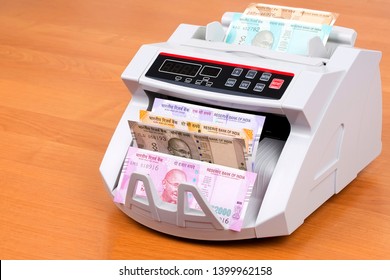 Indian Rupee In A Counting Machine 
