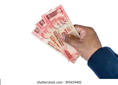 Indian Rupee Currency,money In A Hand Of Business Man Isolated On White Background