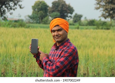 Indian Rural Farmer Young Man Using Mobile Phone Standing Farm Akole, Maharashtra, India - February 02 2020