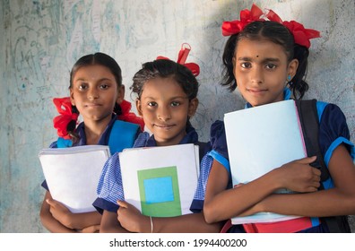 Indian Rural School Girls Holding Books Standing in School - Shutterstock ID 1994400200