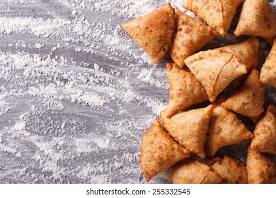 Indian Samosa Pastry On A Floured Table. Horizontal View From Above 