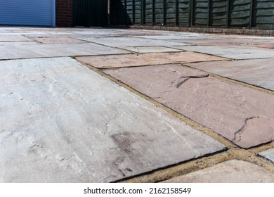 Indian sandstone paving on a domestic driveway - Shutterstock ID 2162158549