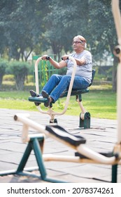 Indian Senior Man Doing Exercise At Public Park