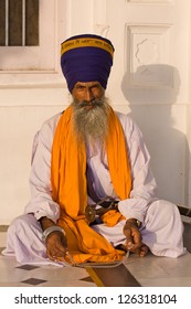 Indian sikh man in turban with bushy beard