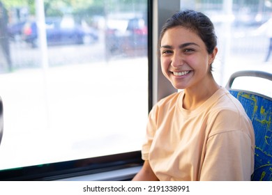 Indian Smiling Woman ride in public transport bus or tram - Powered by Shutterstock
