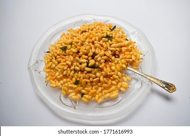 Indian snack Bhel or Churumuri or Churmuri made of Puffed rice is traditional Snack healthy often sold in Mumbai streetfood often for Munching. Isolated indian dish on white background.