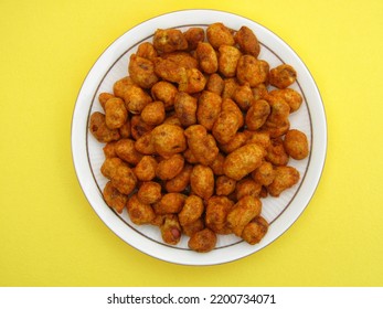 Indian Snack Food Peanut Masala Fry In A Plate On Yellow Background 