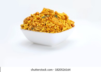 Indian snacks mixture chiwda in white bowl in white background. - Shutterstock ID 1820526164
