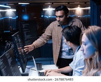 Indian Software Developer Manager Leader presenting Coding Software development application Project, Briefing solution to Programmer Team in Co working Office Space. Tech and artificial intelligence.