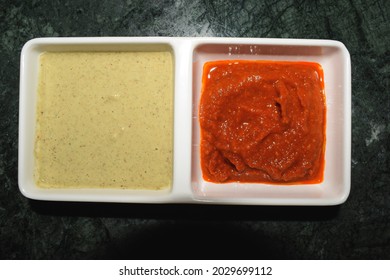 Indian special traditional White and red chutneys which is served and eaten with popular dishes like idli wada sambar and dosa. Coconut chutneys and red spicy chutneys