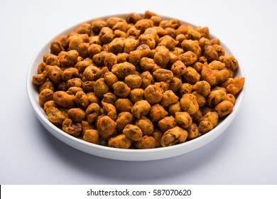 Indian Spiced Coated Fried And Crunchy Masala Peanut. Popular Namkeen Snack. Served In Plate Of Bowl. Selective Focus