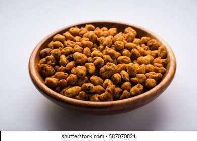 Indian Spiced Coated Fried And Crunchy Masala Peanut. Popular Namkeen Snack. Served In Plate Of Bowl. Selective Focus