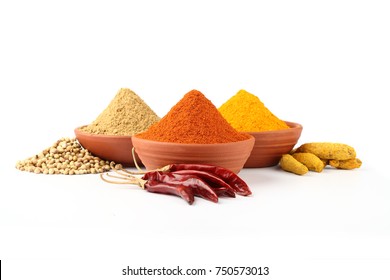  Indian spices, colour full spices in glass bowls - Shutterstock ID 750573013