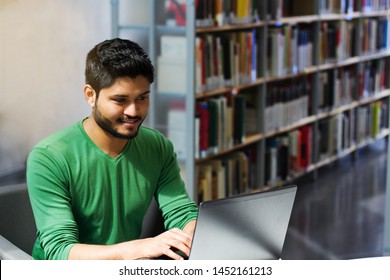 Indian Student Working On Laptop