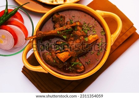 Indian style Mutton OR Gosht Masala OR indian lamb meat rogan josh served with Naan