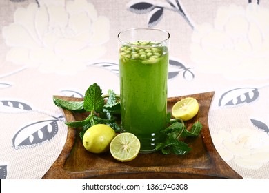 Indian Summer Drink Jaljeera or Jal-Jeera is an Indian beverage prepared with cumin powder in water and served cold with Boondi, Mint and Lemon slice