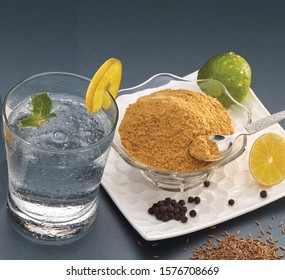 Indian Summer Drink Jaljeera or Jal-Jeera is an Indian beverage prepared with cumin powder in water and served cold with Lemon slice - Image