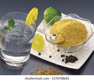 Indian Summer Drink Jaljeera or Jal-Jeera is an Indian beverage prepared with cumin powder in water and served cold with Lemon slice - Image