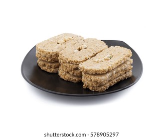 Indian Sweet Gud Kaju Gajak Isolated on White Background 
