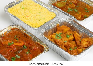 Indian Takeaway Food Selection In Foil Containers.