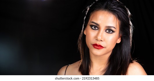 Indian Tanned Skin Asian Woman Show Face Make Up With Backlit Light And Water Splash Spray. Shadow Silhouette Female Head Express Feeling Dramatic Over Beautiful Elegance Black Background Copy Space