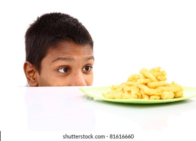 Indian Teen Boy Waiting For Cheese Curls Isolated On White.