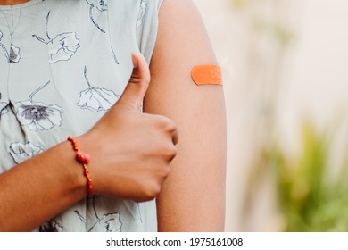 Indian Teen Giving Thumbs Up After Getting Vaccinated And Showing Bandage On His Arm