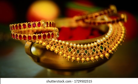 INDIAN TRADITIONAL GOLD JEWELLERY  Necklace and bangles  with red and green gem  