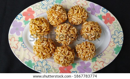 Indian Traditional Puffed Rice Balls is a sweet made using puffed rice mixed with jaggery, Murmura Laddoo, Churmura Laddoo or Pori Urundai