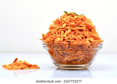 Indian Traditional Spicy And Sweet Mixture Namkeen Also Known as Chivda, Farsan, Chivda, Made of Gram Flour And Mixed With Dry Fruits. on Dark Background - Shutterstock ID 2167713277