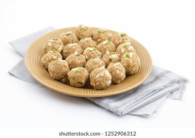 Indian Traditional Sweet Food Urad Dal Laddu Also Know As Laddoo, Ladoo, Laddo Are Ball-Shaped Sweets Made Of Butter, Dry Fruits, Fenugreek And Other Spices. Urad Dal Laddu Sweet Mostly Eat In Winter