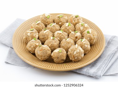 Indian Traditional Sweet Food Urad Dal Laddu Also Know As Laddoo, Ladoo, Laddo Are Ball-Shaped Sweets Made Of Butter, Dry Fruits, Fenugreek And Other Spices. Urad Dal Laddu Sweet Mostly Eat In Winter