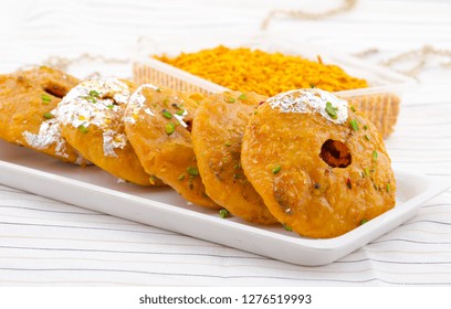 Indian Traditional Sweet Kachori Also Know As Mawa Kachori, Kachauri Or Kachodi, Stuffed Kachori With Condensed Milk, Cheese And Dry Fruits And Served With Sugar Syrup