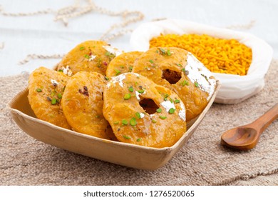 Indian Traditional Sweet Kachori Also Know As Mawa Kachori, Kachauri Or Kachodi, Stuffed Kachori With Condensed Milk, Cheese And Dry Fruits And Served With Sugar Syrup