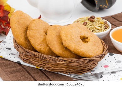 Indian Traditional Sweet Kachori Also Know As Mawa Kachori, Kachauri Or Kachodi, Stuffed Kachori With Condensed Milk, Cheese And Dry Fruits And Served With Sugar Syrup