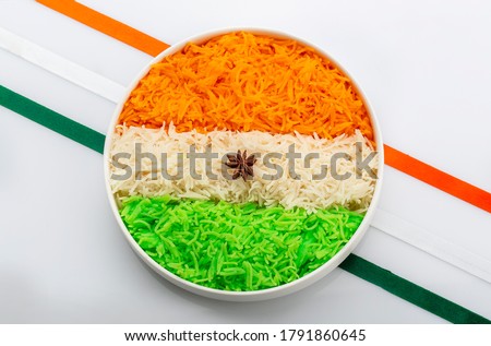 Indian Tricolour or Tiranga Rice for indian Republic and Independence day celebration served in a ceramic plate