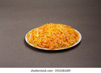 Indian vegetable pod pulav or biryani made from basmati rice, served in a white bowl . selective focus
