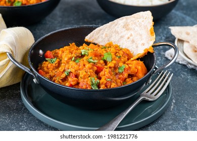 Indian Vegetarian Red Lentil Dhal Curry With Roti