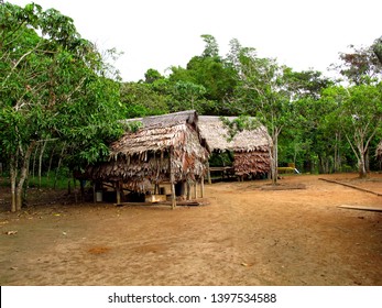 Indian Village Of The Amazon In Peru