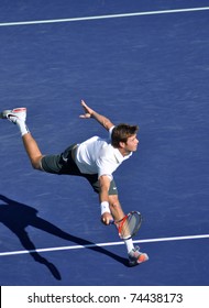 INDIAN WELLS, CA - MARCH 15.  American Ryan Harrison Stretches For A Shot  March 15, 2011 At The BNP Paribas Open.