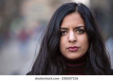 Indian Woman In City Serious Face Portrait