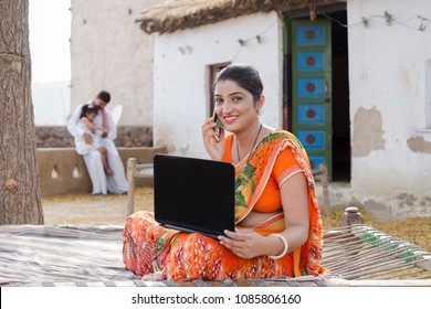  Indian Woman Doing Online Shopping At Home