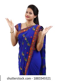 Indian woman giving surprised and happy expression, wearing a traditional Indian wear called Saree or Sari