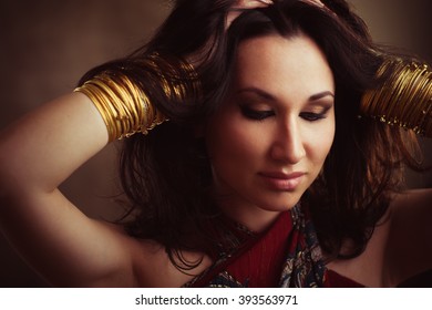 Indian Woman With Gold Bracelets On Hands. Traditional East Accessories On  Indian Woman. Foto Of Indian Girl In East Style.